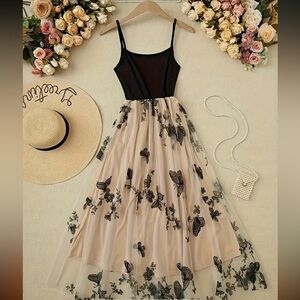 Elegant Black and Cream Floral Dress